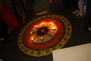 Decorating the house with rangolis and diyas
